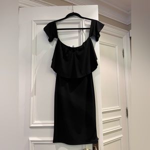 Brand new size xs fully lined black dress